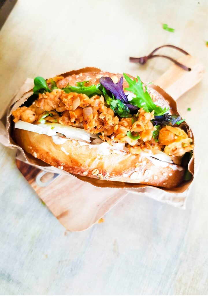 Buffalo chickpea sandwich with green and onions