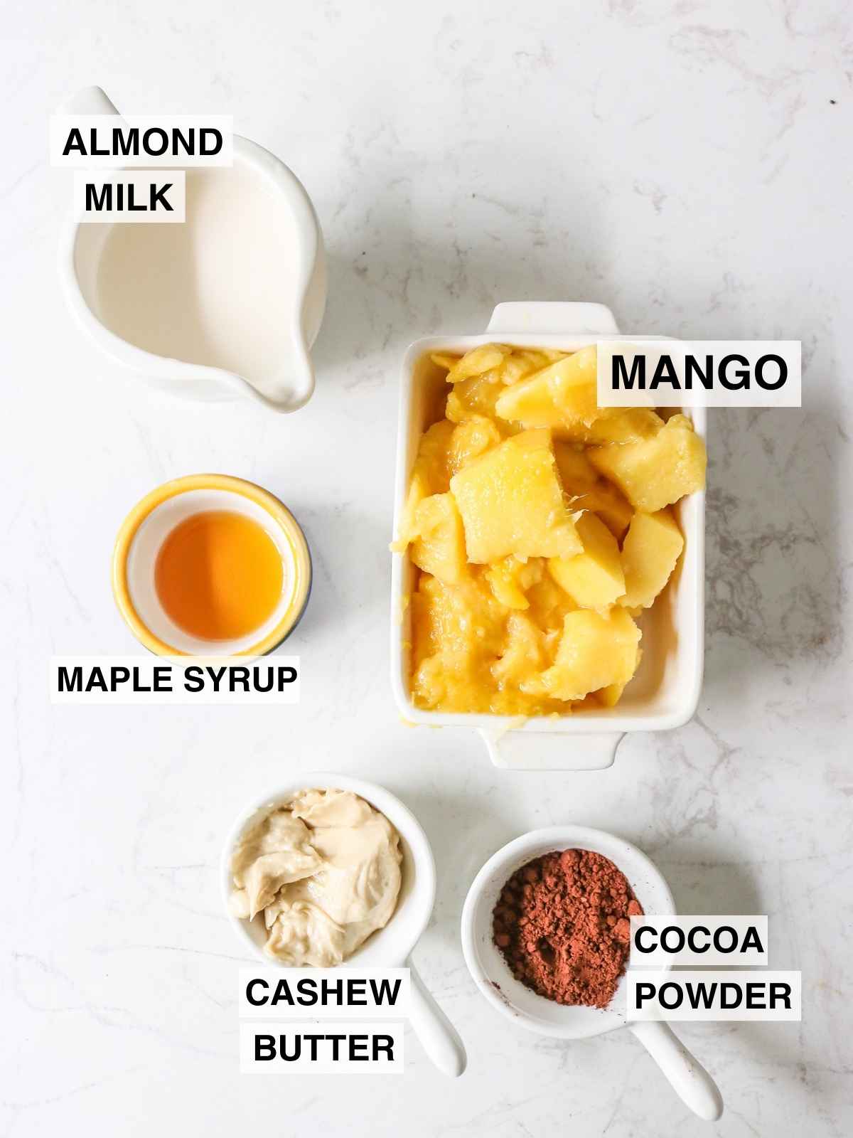 ingredients to make chocolate mango smoothie.