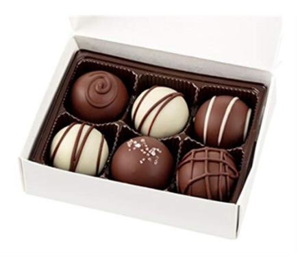 white chocolate box with vegan chocolate truffles