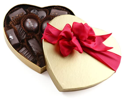 golden heart shape chocolate box with red ribbon