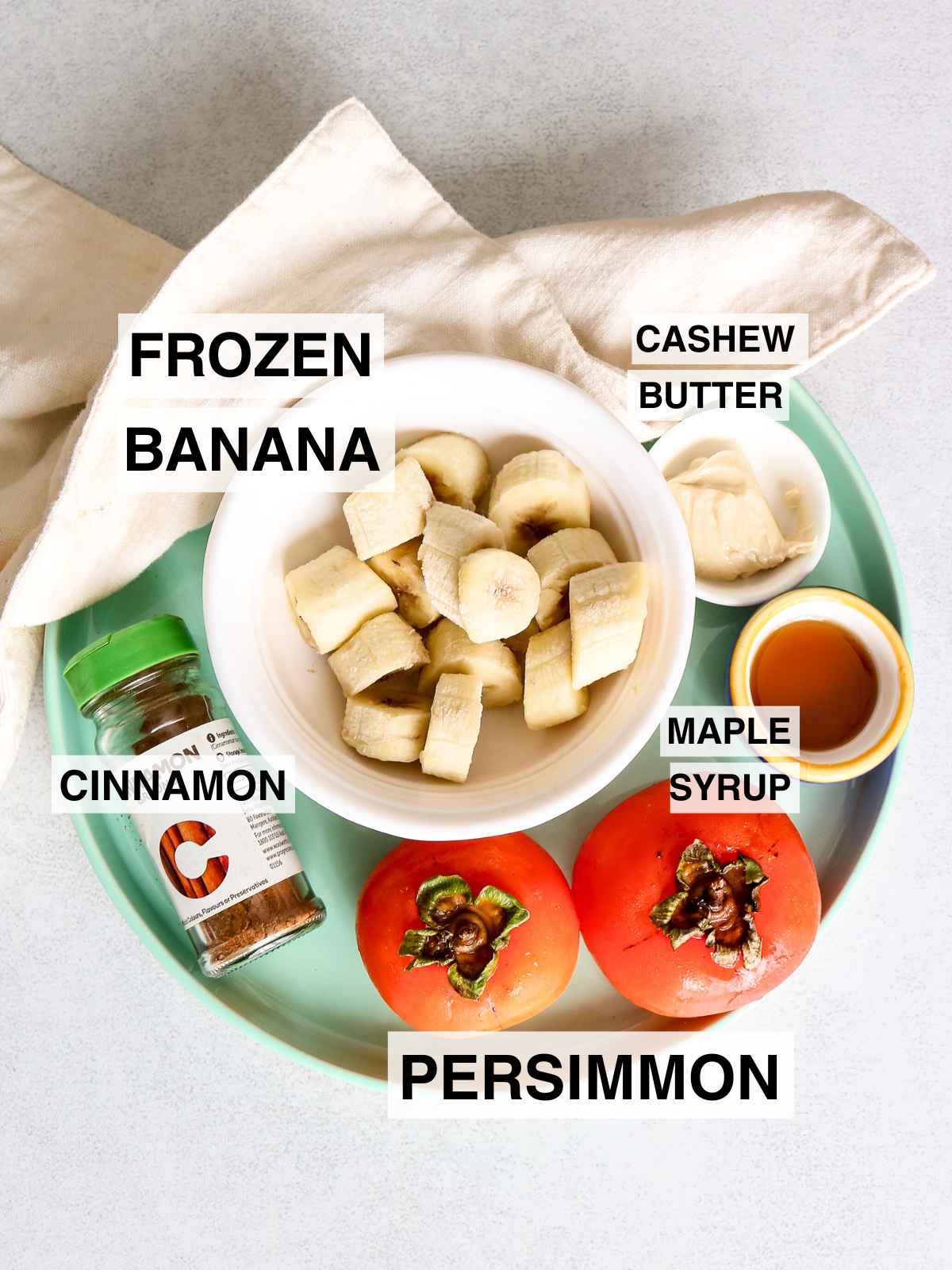 Ingredients placed on a plate to make persimmon smoothie.